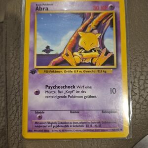 Pokemon Trading Card - Yellow and Purple Abra